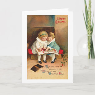 Weihnachtskarte Kinder beim Lesen eines Buches Feiertagskarte
