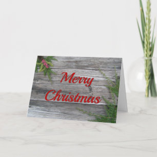 Weihnachtskarte mit Kiefer und verwittertem Holz Feiertagskarte