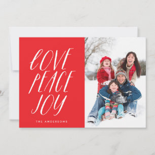 Weihnachtskarte mit weißer Schrift und den Worten Feiertagskarte