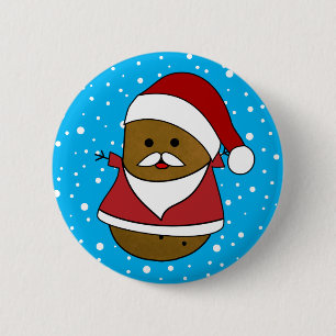 Weihnachtskartoffel in einem Weihnachtsmannhut und Button