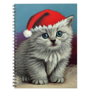 Weihnachtskatze im Weihnachtsmannmütze Notizblock