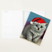 Weihnachtskatze im Weihnachtsmannmütze Planer (Anzeige)