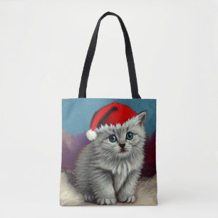 Weihnachtskatze im Weihnachtsmannmütze Tasche