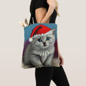 Weihnachtskatze im Weihnachtsmannmütze Tasche (Von Nahem)