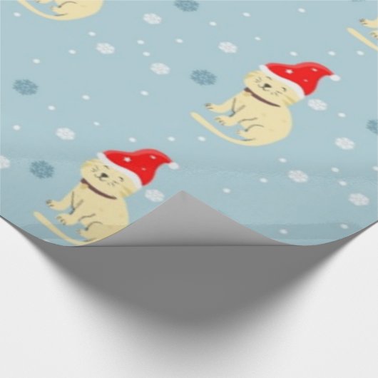 Weihnachtskatze mit Hut auf blau Geschenkpapier (Ecke)