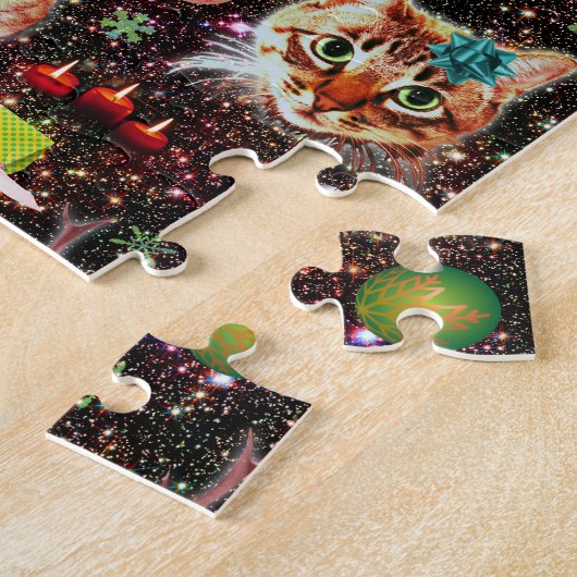 Weihnachtskatzen in der Raum-Galaxie spielt Puzzle (Seite)