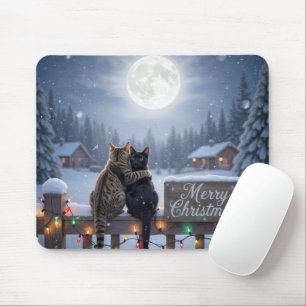 Weihnachtskatzen umarmen sich auf einem schneebede mousepad
