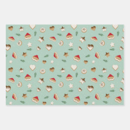 Weihnachtskekse auf grün und rosa geschenkpapier set