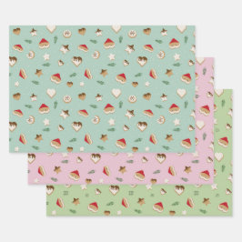Weihnachtskekse auf grün und rosa geschenkpapier set