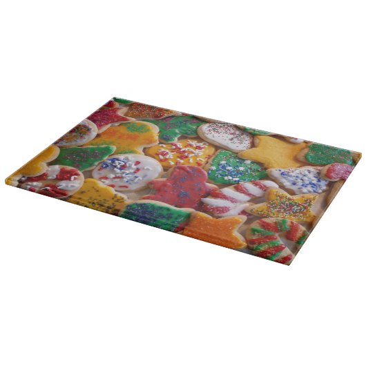 Weihnachtskekse ich farbenfrohe Weihnachtsgebäck Schneidebrett (Ecke)