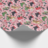 Weihnachtskinder mit schwarzen und orangefarbenen geschenkpapier (Ecke)