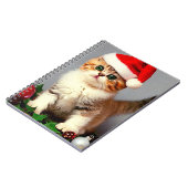 Weihnachtskitten in Weihnachtsmannmütze Notizblock (Linke Seite)