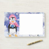 Weihnachtsklebrige Notizen Kleiner Pinguin mit Ges (Auf Schreibtisch)