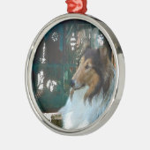 Weihnachtskollie am Fenster Silbernes Ornament (Links)