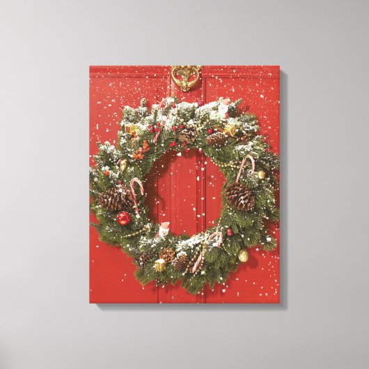 Weihnachtskranz an einer Tür Leinwanddruck (Vorderseite)