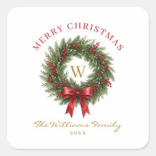 Weihnachtskranz mit rotem Band und Monogramm Quadratischer Aufkleber