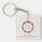 Weihnachtskranz mit rotem Bogen. Schlüsselanhänger (Vorderseite)