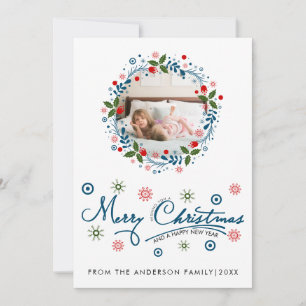 Weihnachtskranz und blaues Schrift-typografisches  Feiertagskarte