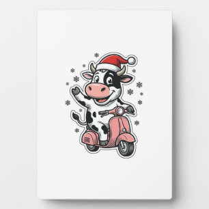 Weihnachtskuh fährt auf rosa Roller Vintage Vektor Fotoplatte