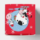 Weihnachtskühe mit Weihnachtsmannmützen Geschenkschachtel (Oben)
