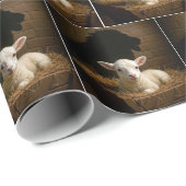 Weihnachtslamm in einer Krippe mit Löwenschatten Geschenkpapier (Rolleneckpunkt)