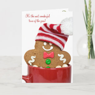 Weihnachtslebkuchenmann im heißen Kakao Feiertagskarte