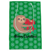 Weihnachtsliegeplatz mit Geschenk Grüner Schneeflo Mittlere Geschenktüte (Vorderseite)