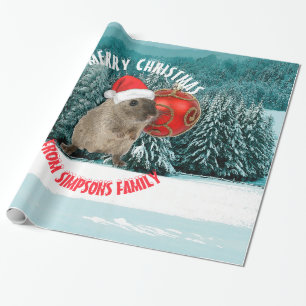 Weihnachtslustiger Hamster in der roten Geschenkpapier