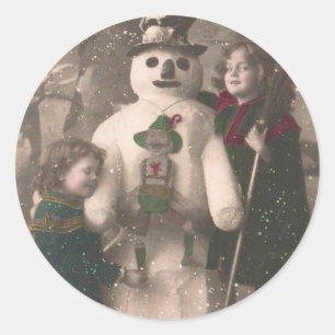 Weihnachtsmädchen und Schneemann Vintage-Foto Runder Aufkleber