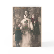 Weihnachtsmädchen und Snowman Vintages Foto