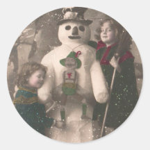 Weihnachtsmädchen und Snowman Vintages Foto
