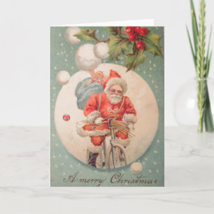 Weihnachtsmann auf Fahrrad-Grußkarte Feiertagskarte