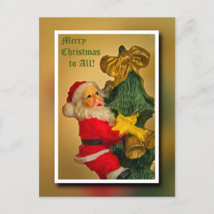 Weihnachtsmann, der auf den Weihnachtsbaum kletter Feiertagspostkarte