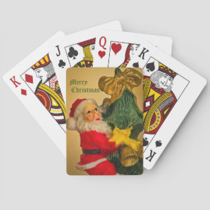 Weihnachtsmann, der auf den Weihnachtsbaum kletter Spielkarten