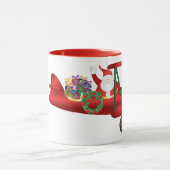 Weihnachtsmann, der auf Doppeldecker mit der Tasse (Zentrum)