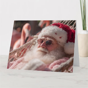 Weihnachtsmann entspannt sich in der Hängematte un Karte