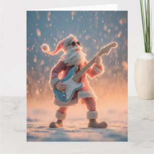 Weihnachtsmann-Figur beim Spielen einer E-Gitarre Karte