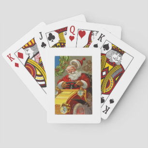 Weihnachtsmann im Oldtimer fährt ein gelbes Auto Spielkarten