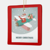Weihnachtsmann in einem Flugzeug Keramikornament (Links)