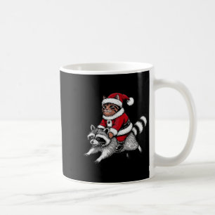 Weihnachtsmann-Katze reitet auf einem Waschbären W Kaffeetasse