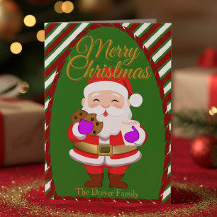 Weihnachtsmann mit Keksen gefaltete Feiertagskarte