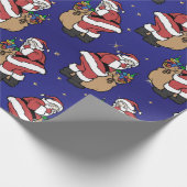 Weihnachtsmann mit "Sackful of Toys on Blue" Geschenkpapier (Ecke)