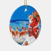 Weihnachtsmann oben auf der Dachspitze im Schnee Keramikornament (Rechts)