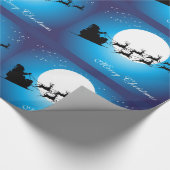 Weihnachtsmann, Pferdeschlitten u. Ren gegen Geschenkpapier (Ecke)