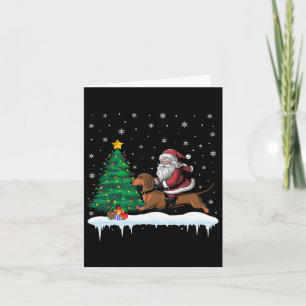 Weihnachtsmann reitet auf Dachshund-Hund Jungen Mä Karte
