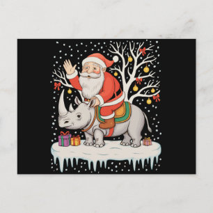 Weihnachtsmann reitet auf Nashorn Schnee Weihnacht Feiertagspostkarte