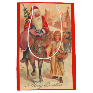 Weihnachtsmann reitet einen Esel Frohe Weihnachten Mittlere Geschenktüte