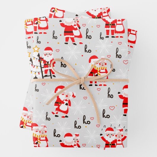 Weihnachtsmann und Frau Claus Weihnachtsfeier Geschenkpapier Set (Beispiel)