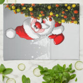 Weihnachtsmann und Rentiere hinter einem Weihnacht Geschirrtuch (Gefaltet)