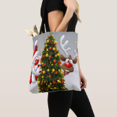 Weihnachtsmann und Rentiere hinter einem Weihnacht Tasche (Von Nahem)